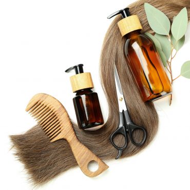 Concept of hair care on white table